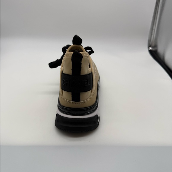 CHANEL Cream and Black Athletic Shoes